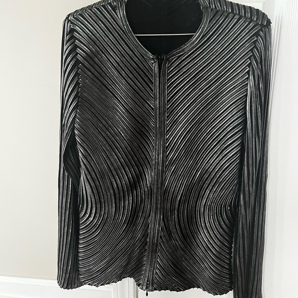 Leather-like jacket that is a great compliment to any black outfit. - Picture 1 of 6